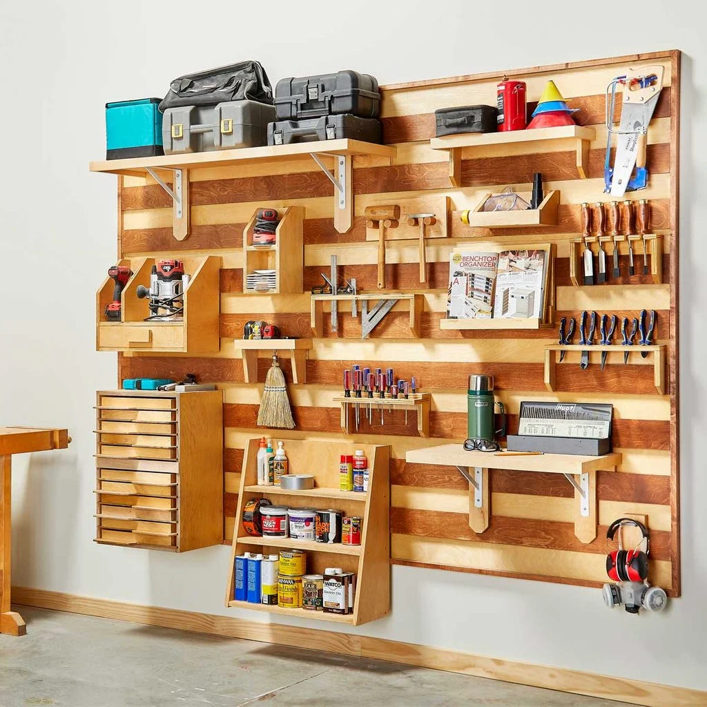 1. A versatile wooden wall storage system for tools and more, featuring a French cleat design with various mounting options. 2. Get organized with this wooden wall-mounted tool storage system, complete with a French cleat project and multiple tool mounting choices. 3. Discover the perfect solution for storing your tools with this wooden wall-mounted system, showcasing a French cleat project and versatile mounting options.