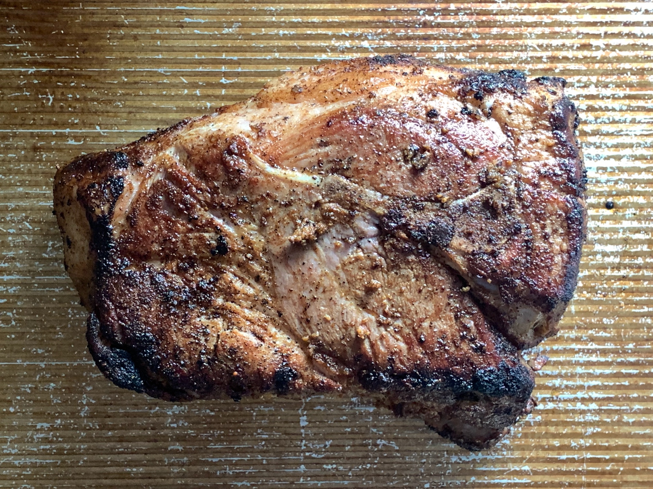 seared pork shoulder, removed from dutch oven
