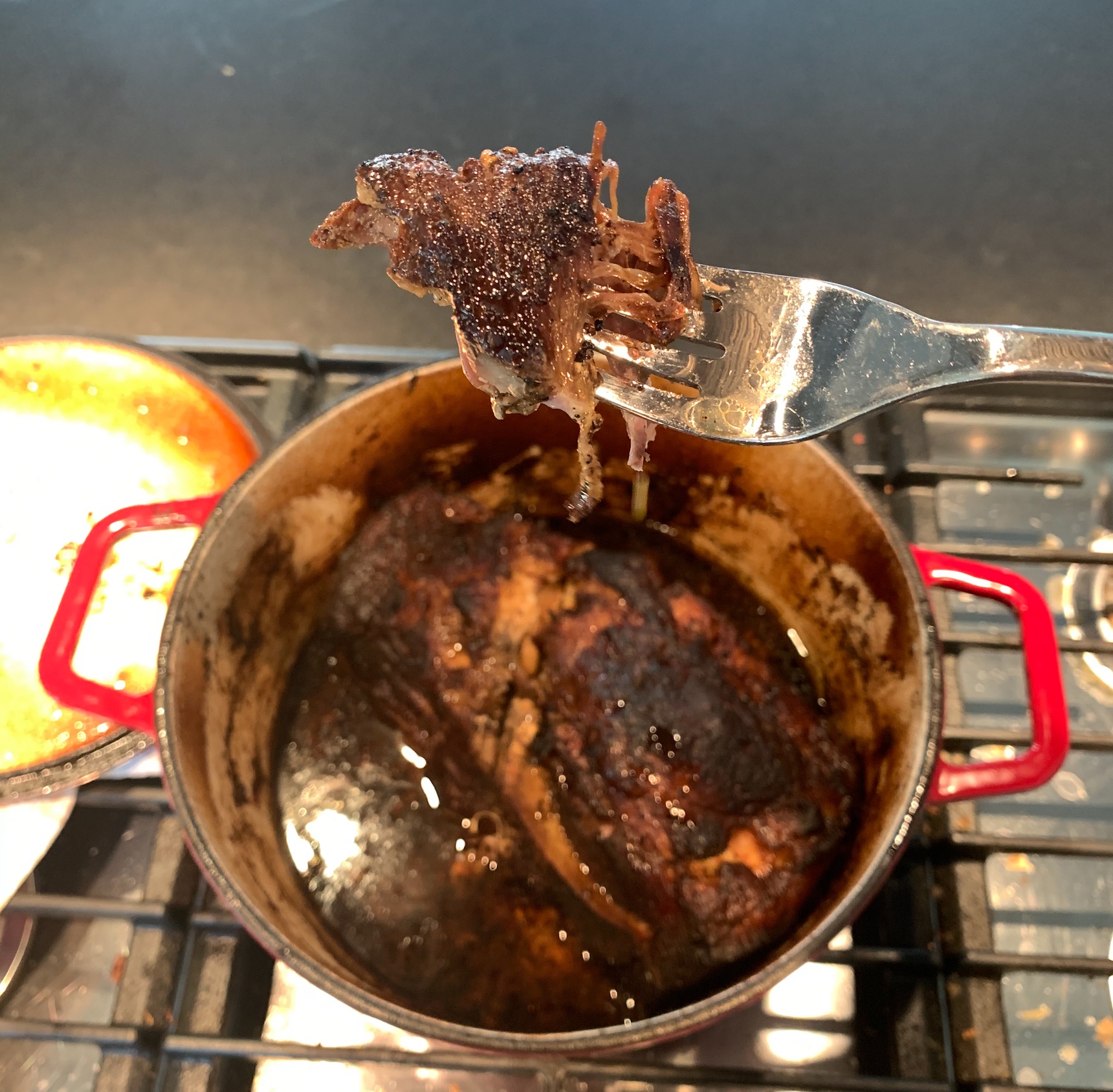 fork-pulled pork shoulder above the finished product